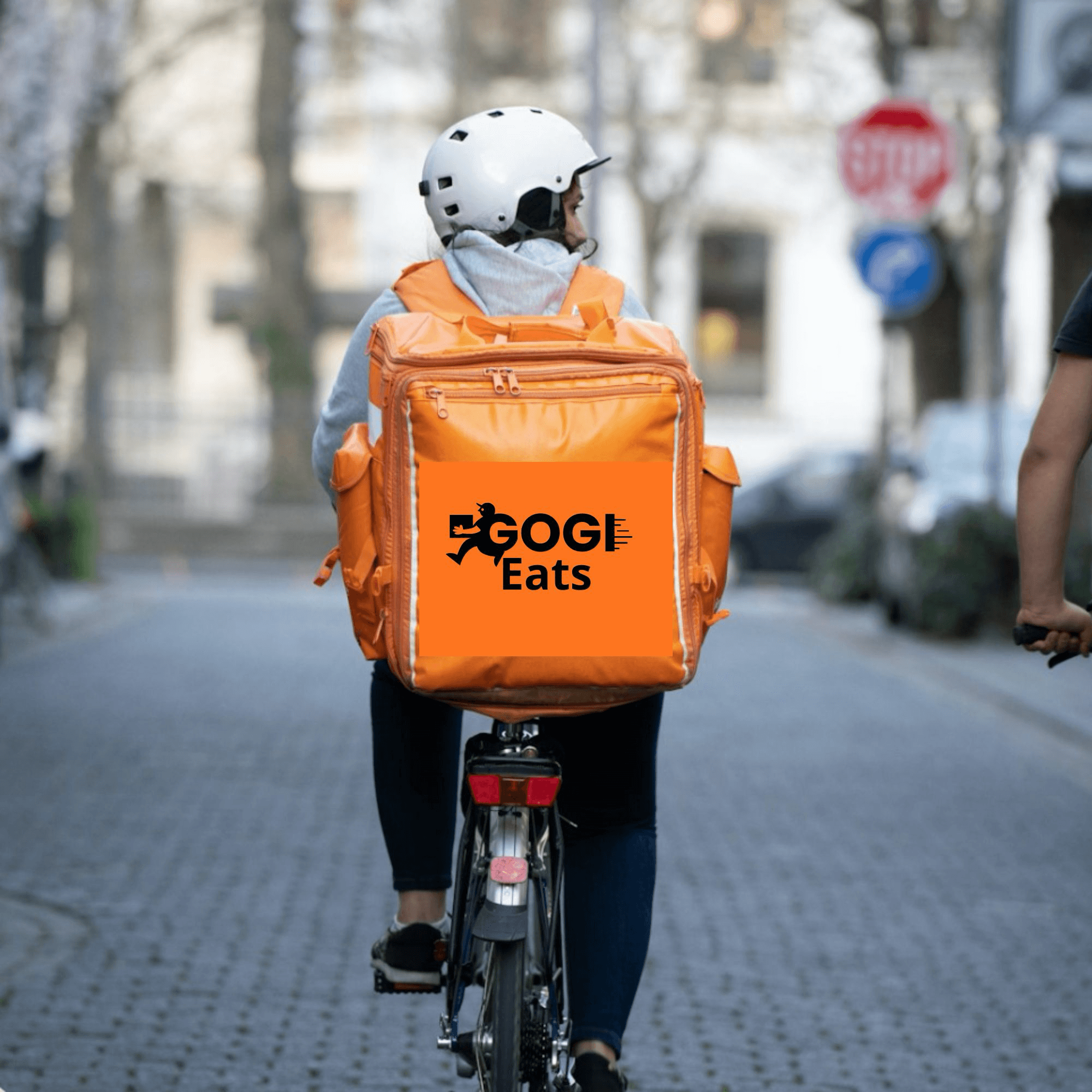 Repartidor de Gogi Eats en bicicleta